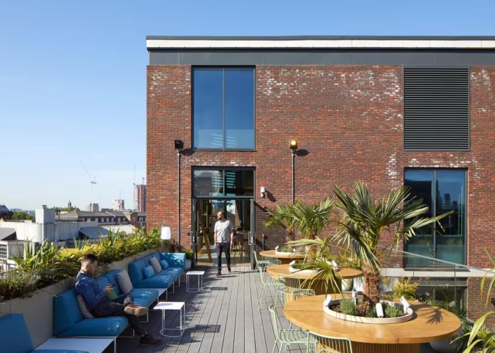 Stylish rooftop venue with greenery for networking events and cocktail receptions.