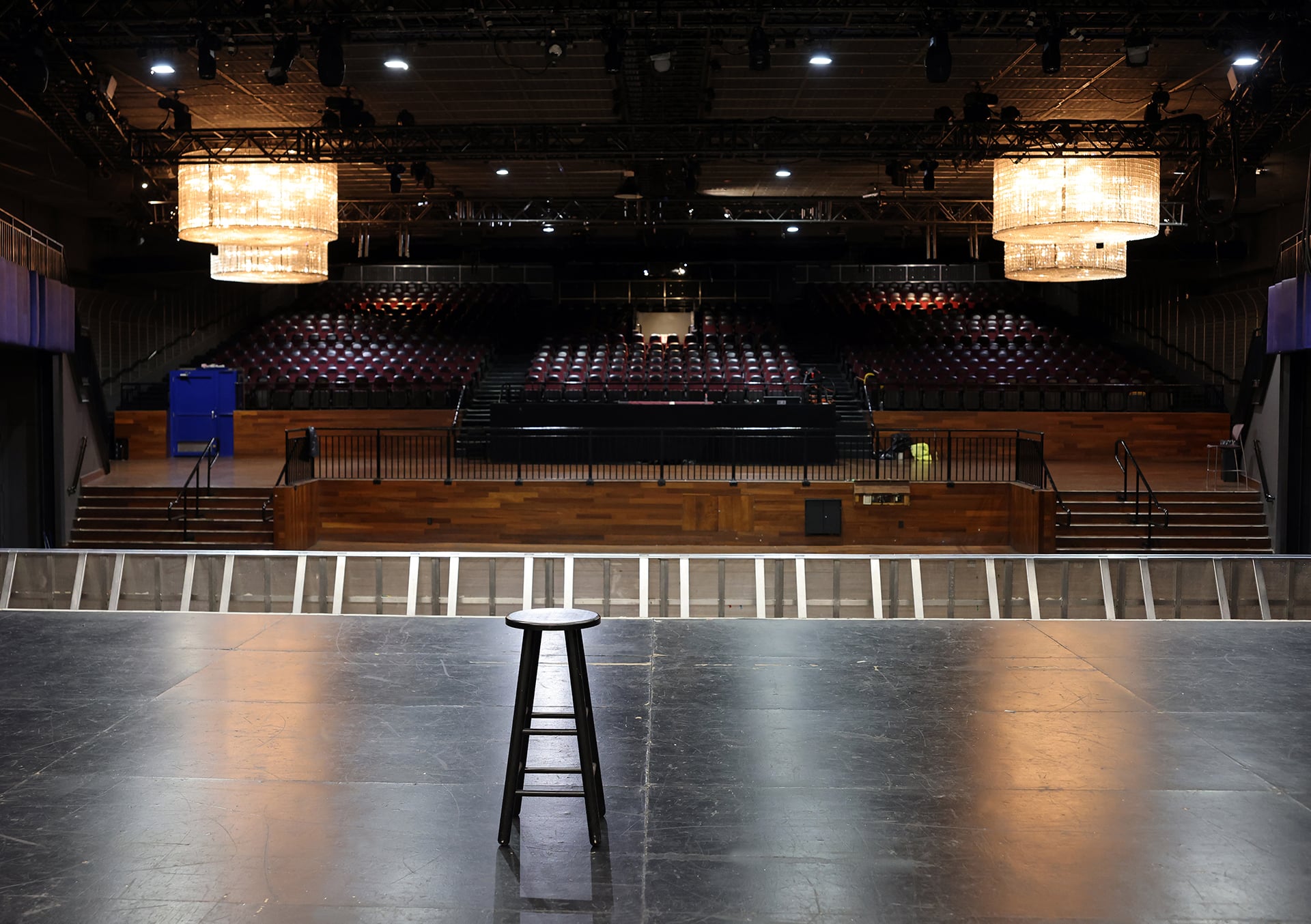Concert venue in Times Square with polished stage and elegant chandeliers for concerts and events.