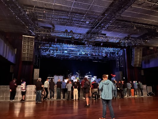 Concert stage at Palladium Times Square, ready for live music event with excited crowd.