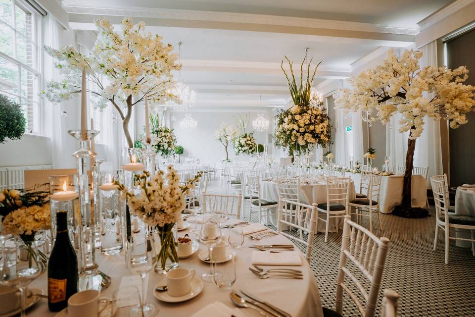 Elegant wedding venue with floral decor at Hawkstone Hall & Gardens.