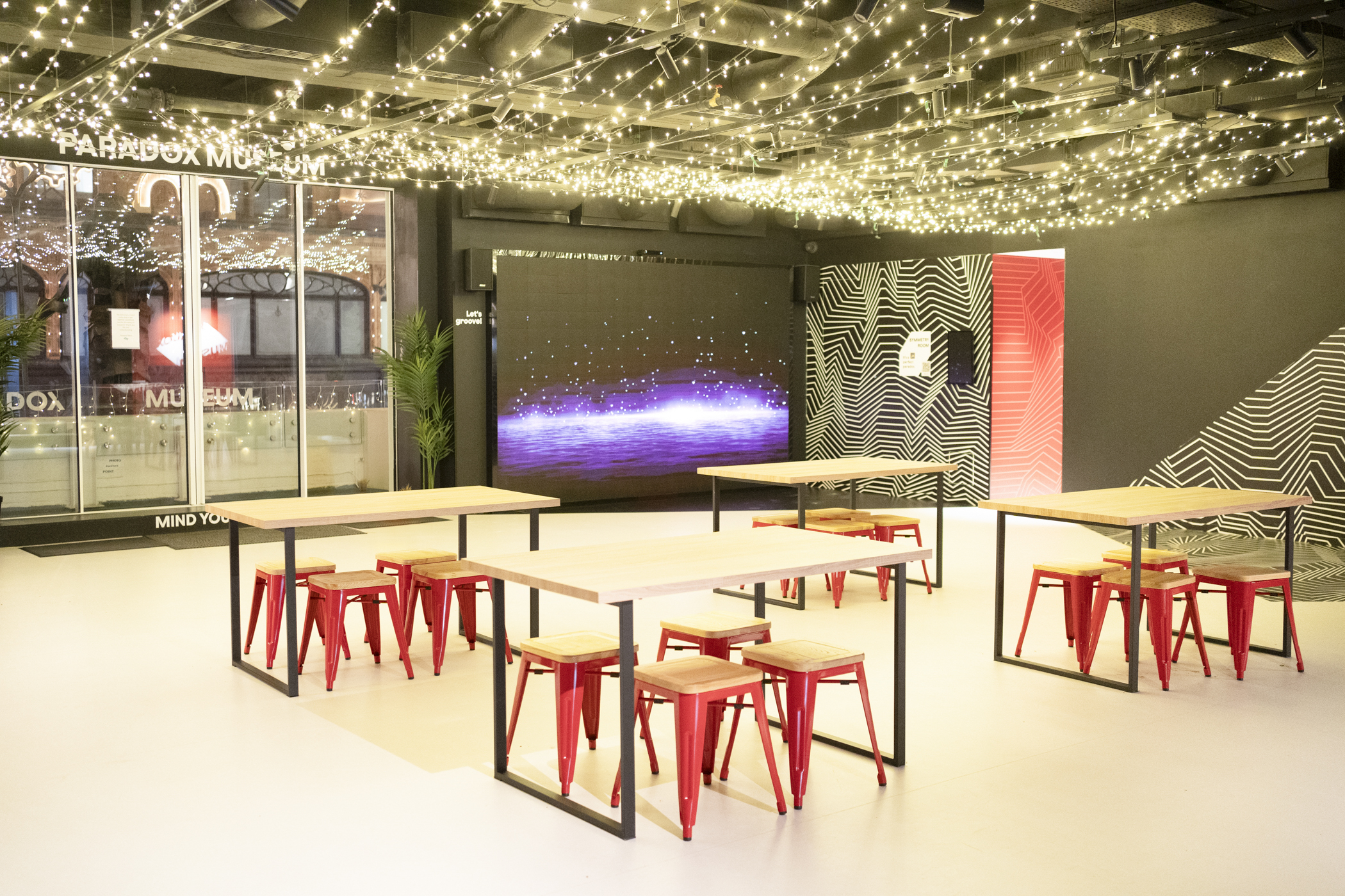 Main Atrium, Paradox Museum London, modern event space for workshops and networking.