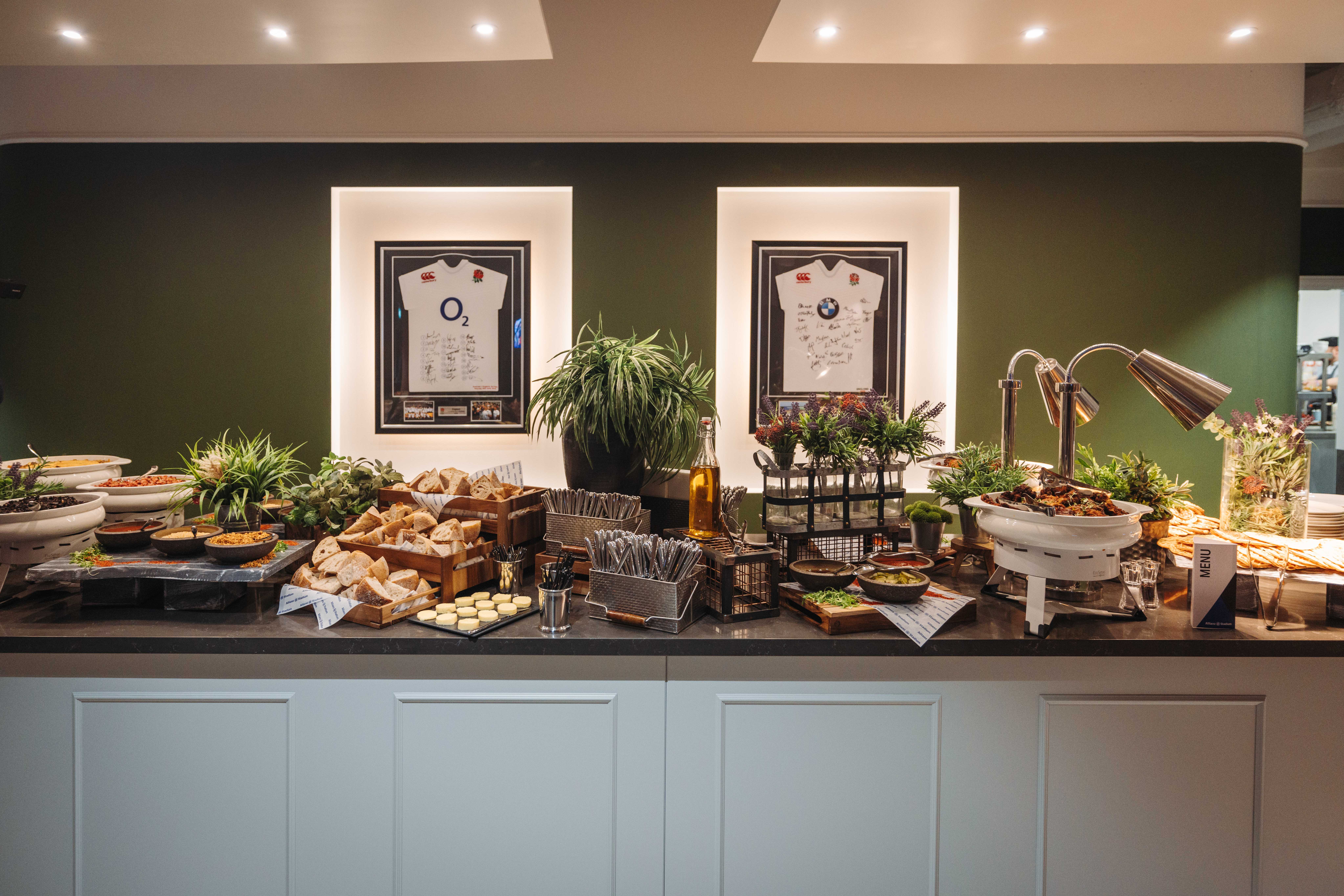 Allianz Suite catering station at Twickenham Stadium with gourmet food for events.