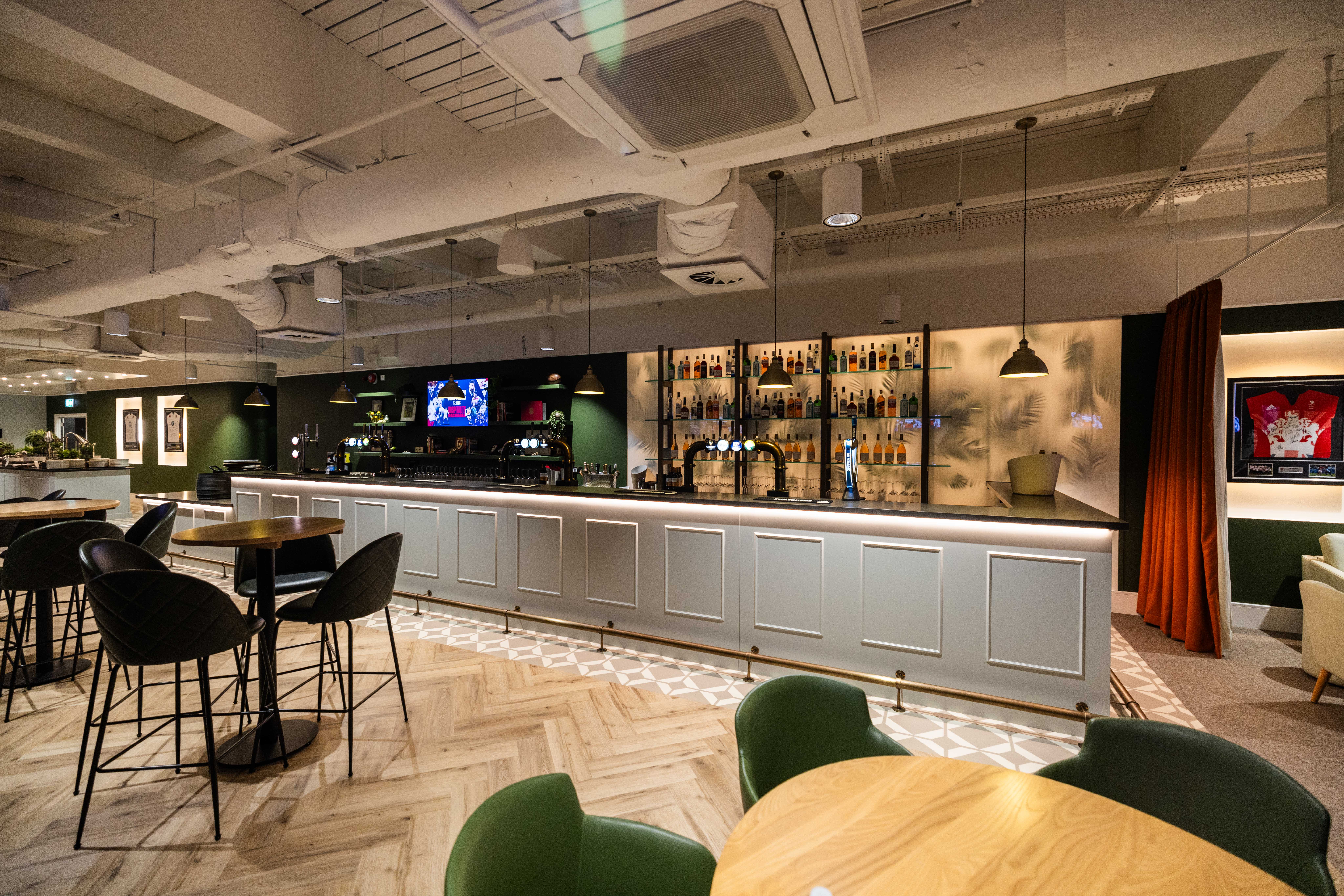 Modern bar area in Allianz Suite, Twickenham for networking events and social gatherings.