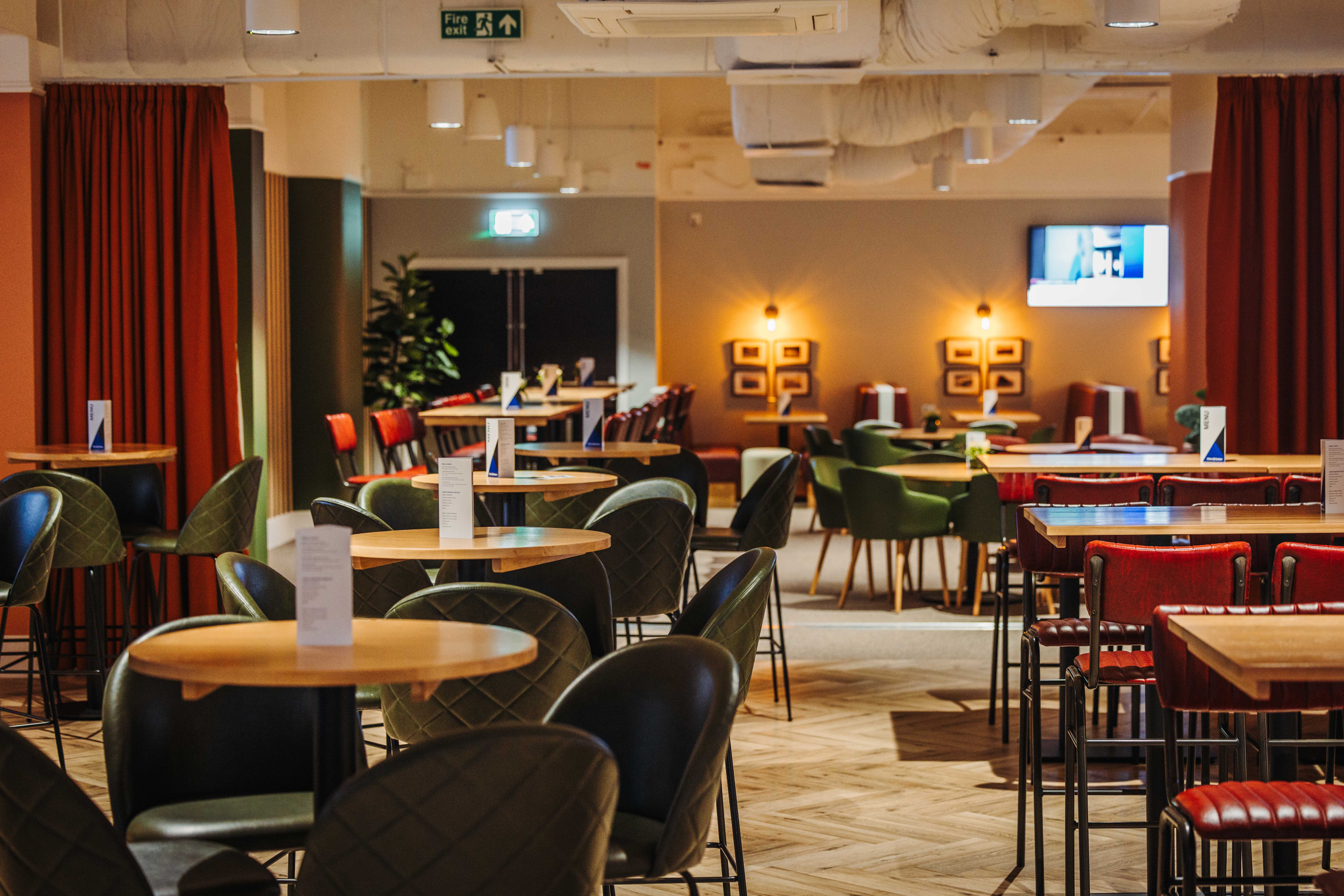 Allianz Suite at Twickenham Stadium, inviting event space for networking and presentations.