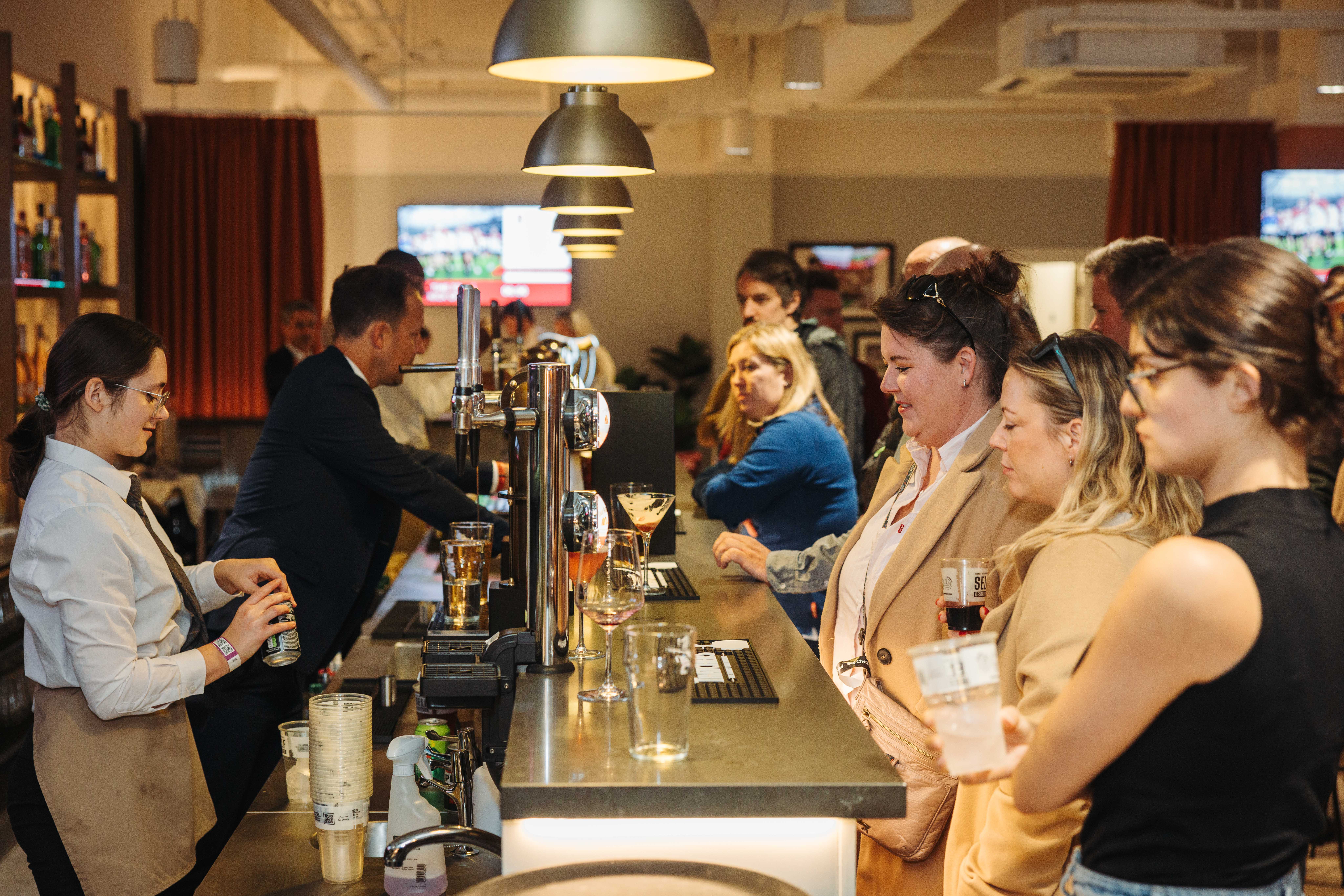 Allianz Suite at Twickenham Stadium during a vibrant networking event.