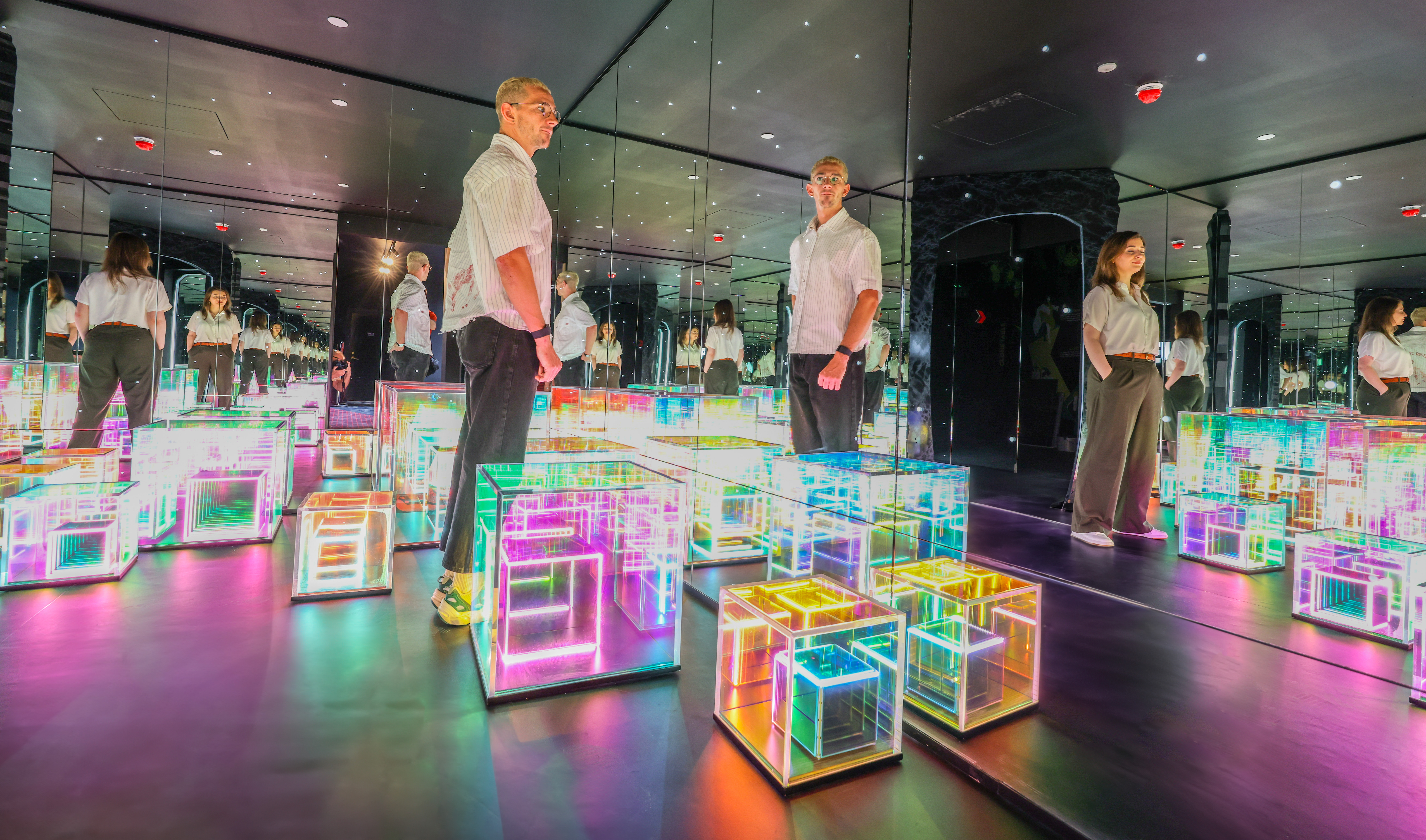 Modern immersive event space with illuminated cubes at Paradox Museum London.