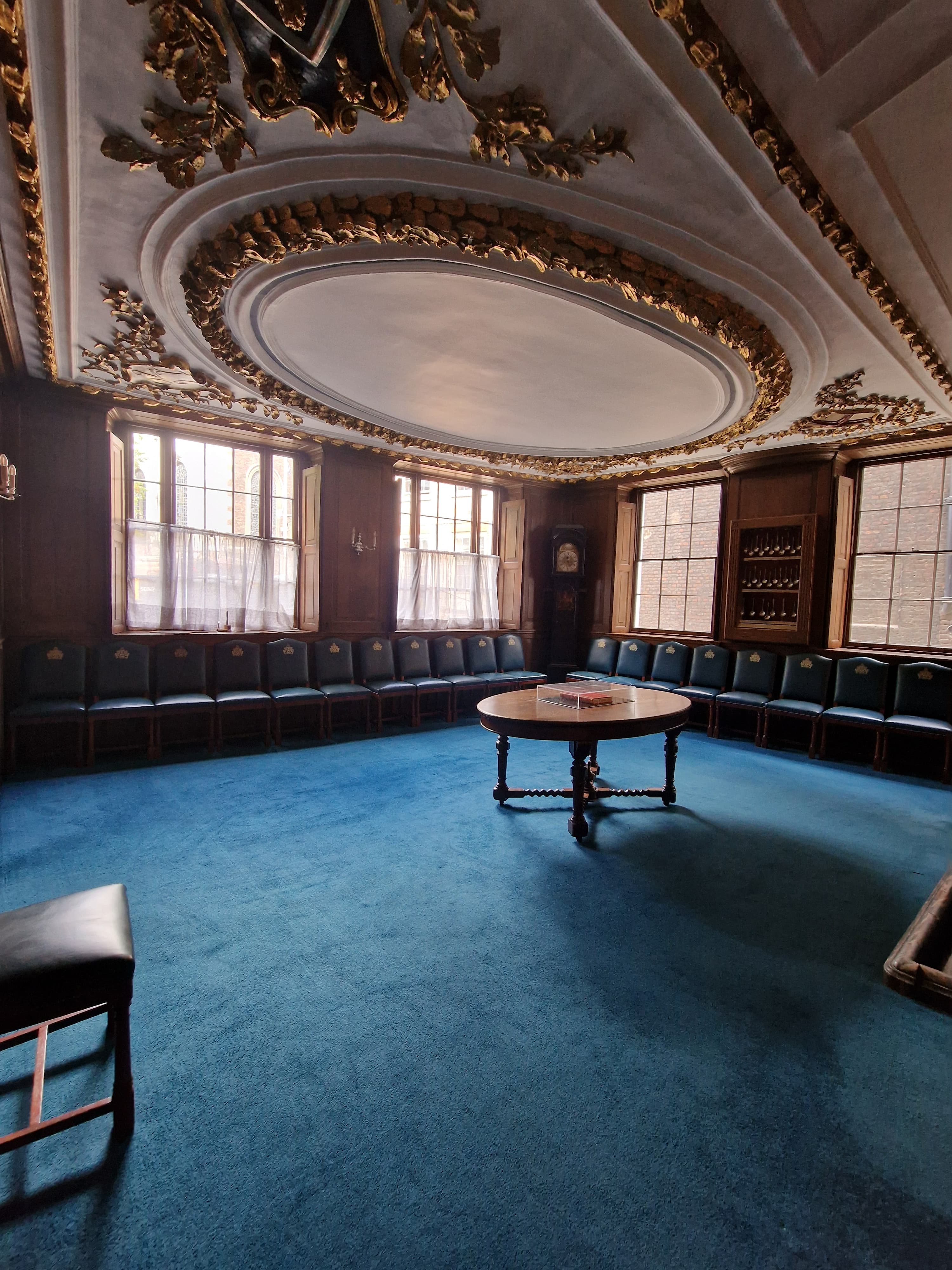 Old Court Room in Innholders' Hall, elegant meeting space with plush blue carpet.