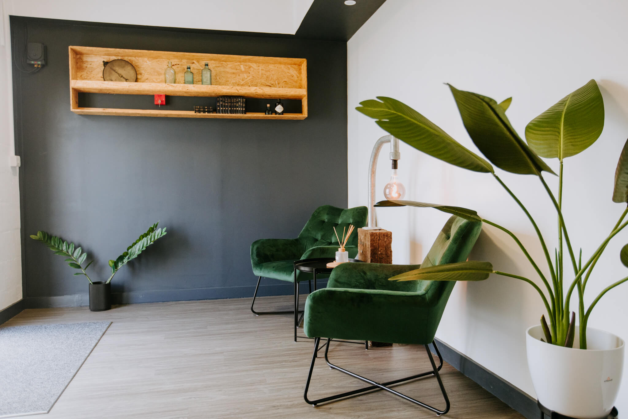 Stylish meeting space with modern green chairs for creative brainstorming sessions.