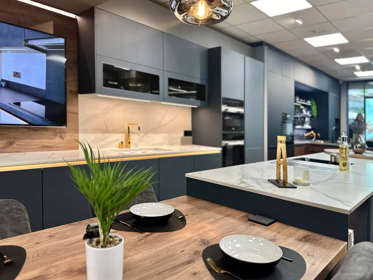 Modern kitchen with spacious island, perfect for culinary events and cooking demos.