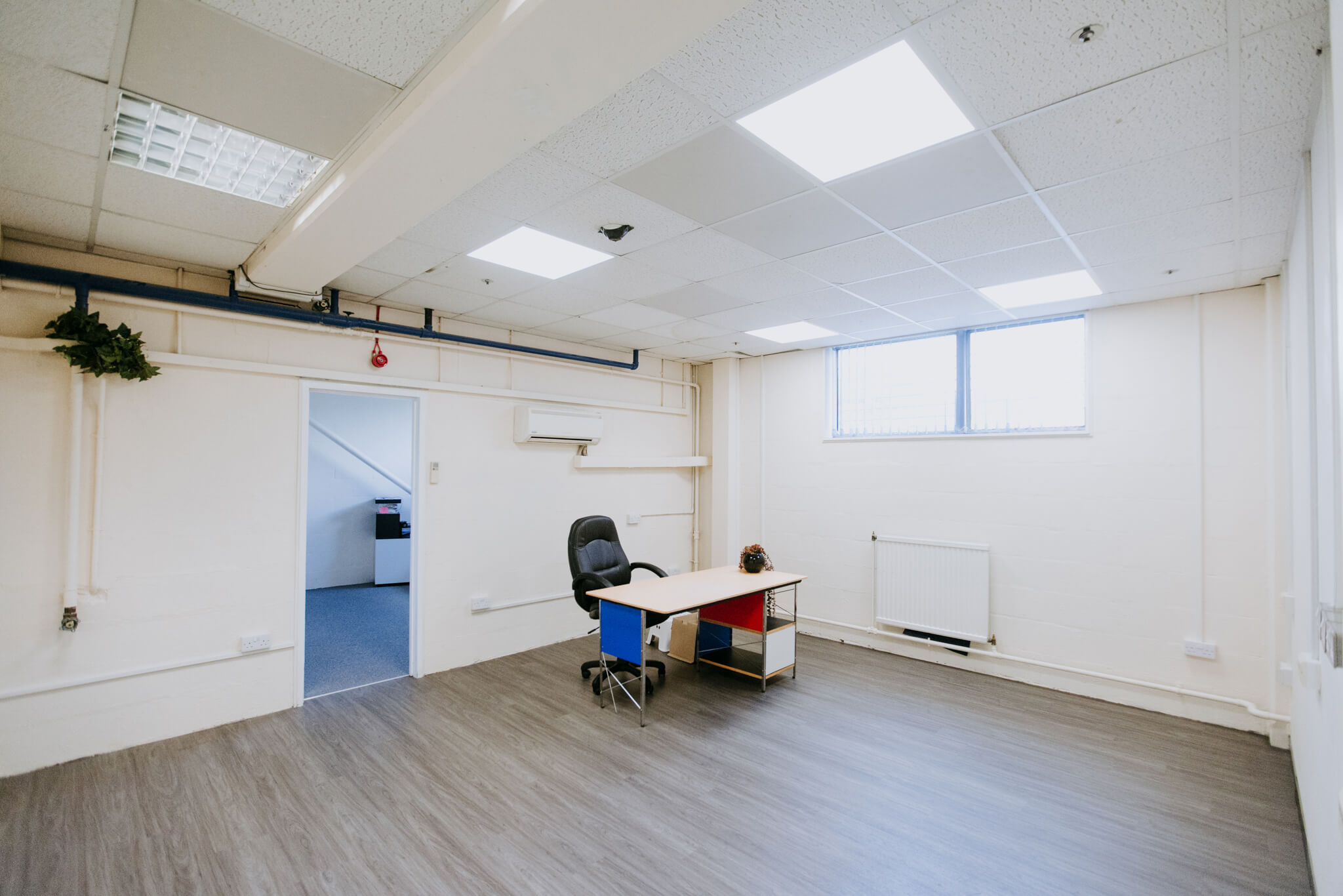 Minimalist kitchen area in Document Bristol, ideal for brainstorming and team meetings.