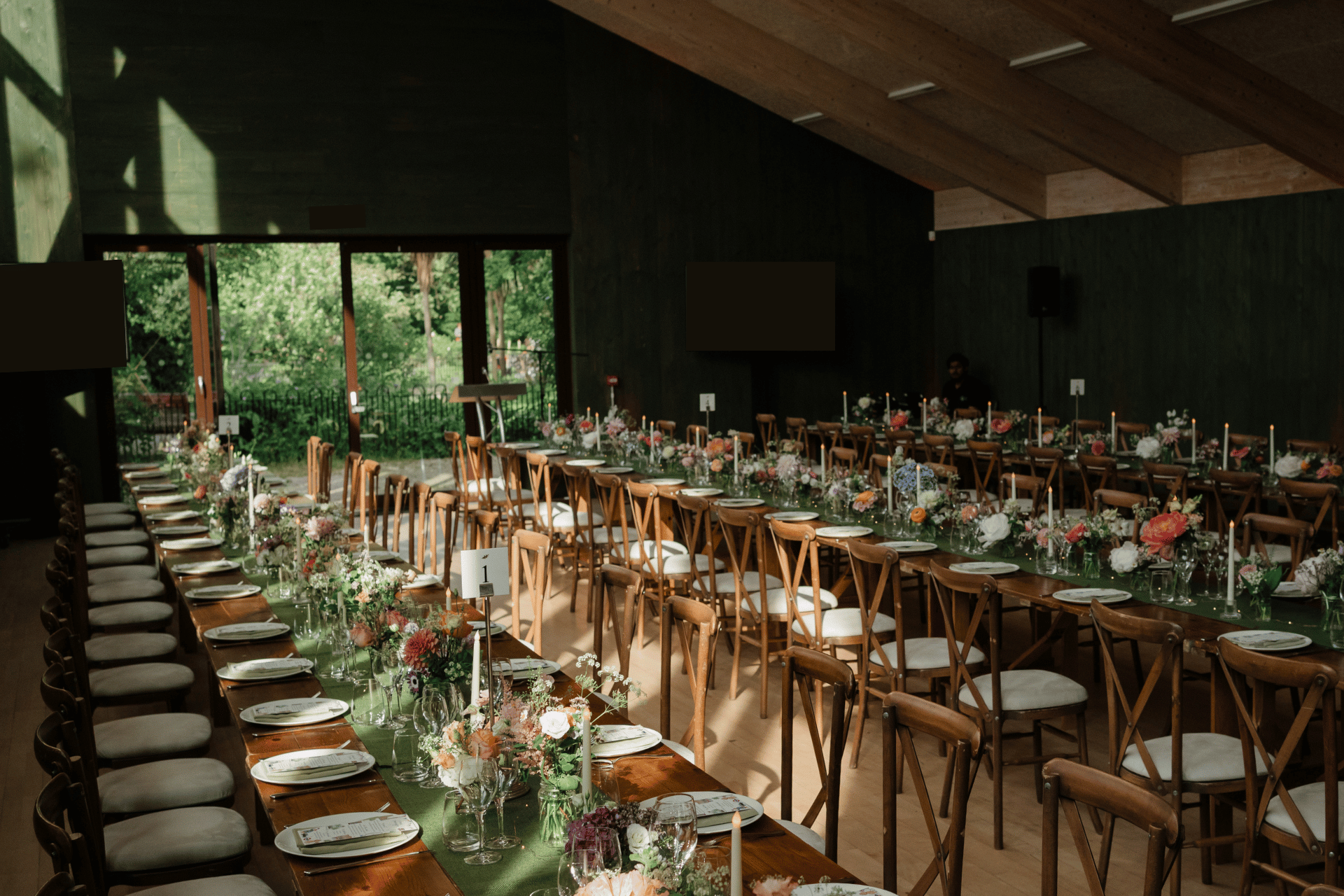 Elegant event space in Sands End with floral centerpieces, ideal for weddings and retreats.