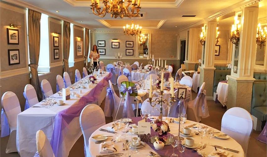 Elegant banquet setting in Secret Garden, Royal Bath Hotel, perfect for weddings and upscale events.