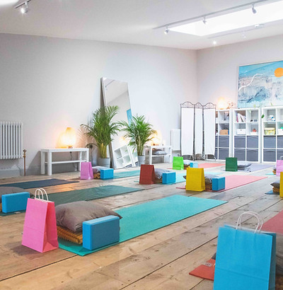 Serene wellness treatment room with yoga mats for mindfulness workshops and retreats.