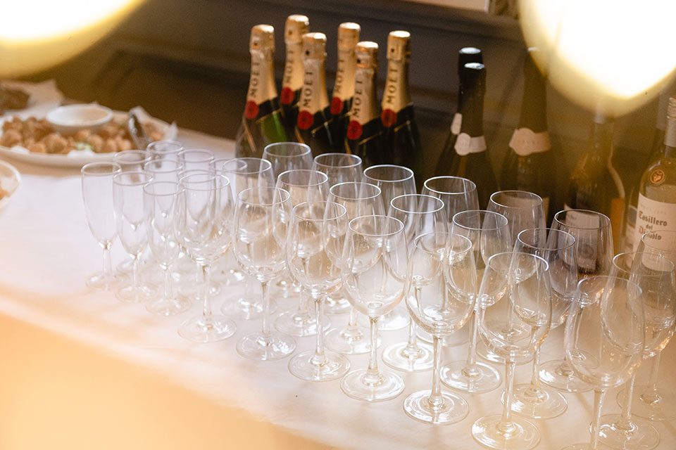 Elegant champagne flutes at a private event beverage station in The Court Oak Harborne.