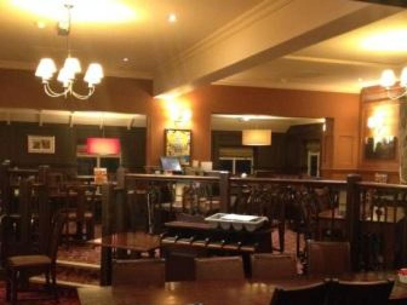 Cozy bar venue in The Court Oak Harborne, ideal for intimate meetings and events.