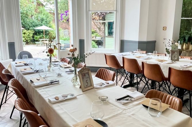 Private function room at The Blue Piano, elegantly arranged for intimate gatherings.