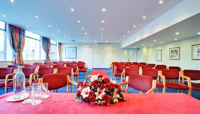 Function Suite at Plough & Harrow Hotel, elegant meeting room for presentations and workshops.