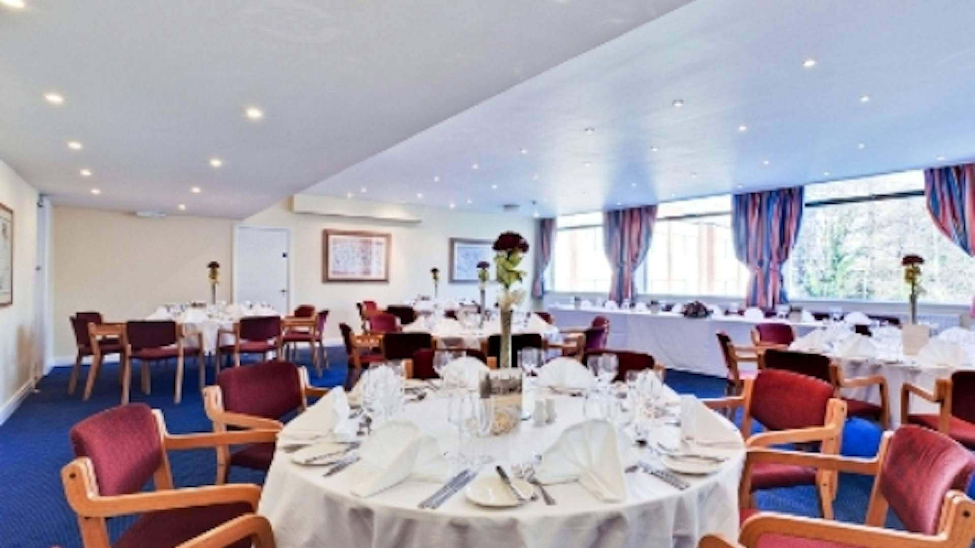 Elegant event space at Plough & Harrow Hotel, ideal for formal dinners and networking.