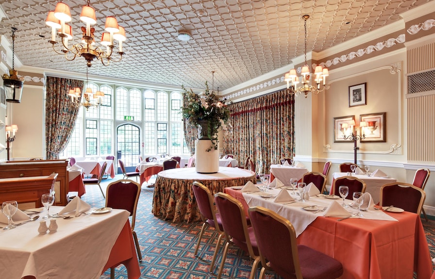 Elegant banquet room at Plough & Harrow Hotel, perfect for weddings and corporate events.
