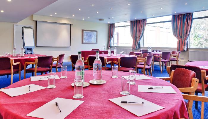 Meeting Room Gallery at Plough & Harrow Hotel, bright space for workshops and conferences.
