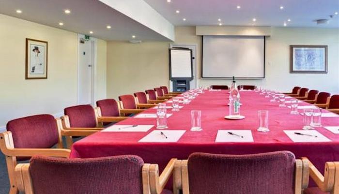 Meeting Room Gallery at Plough & Harrow Hotel, set for professional events and presentations.