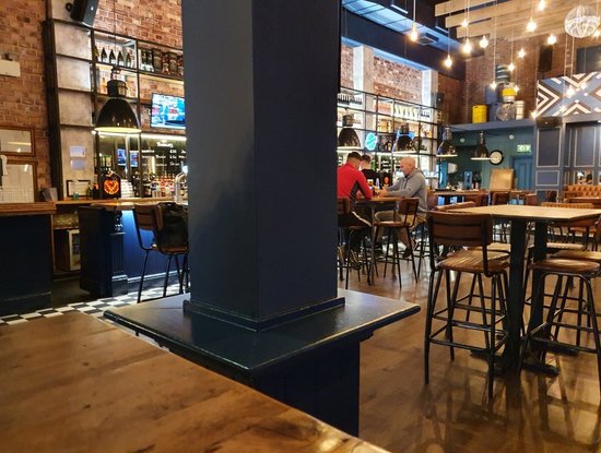 Stylish venue with rustic decor, perfect for casual meetings and networking events.