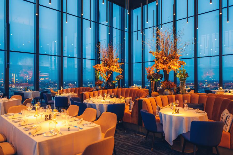 Private dining room in Orelle with panoramic views, ideal for upscale events and celebrations.