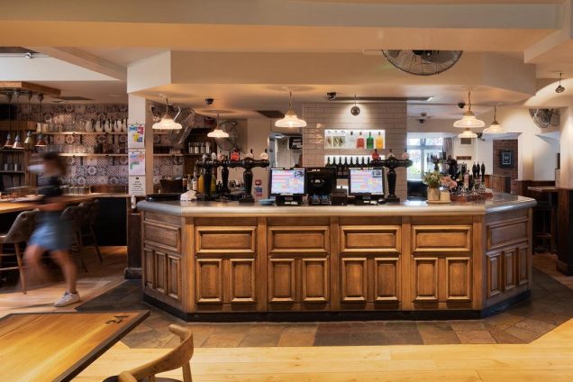 Welcoming bar area in The Plough Harborne, ideal for networking events and gatherings.