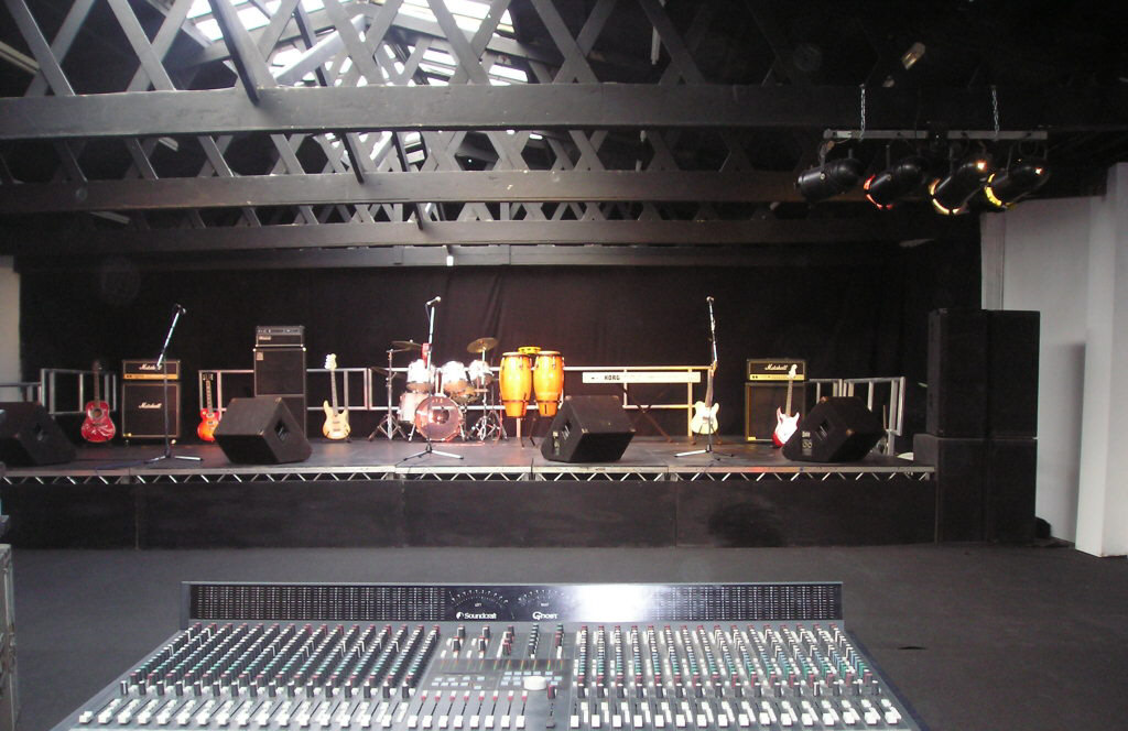 Dance Room at Robannas Studios with stage, ideal for concerts and corporate events.