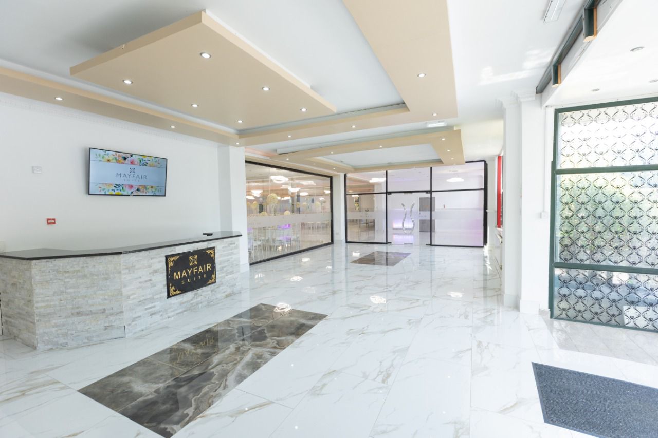 Modern Mayfair Suite lobby with marble flooring, perfect for events and networking.