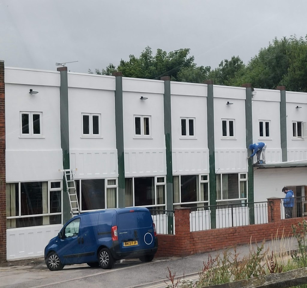 Social club exterior renovations in Greenland's Inn for upcoming events and gatherings.