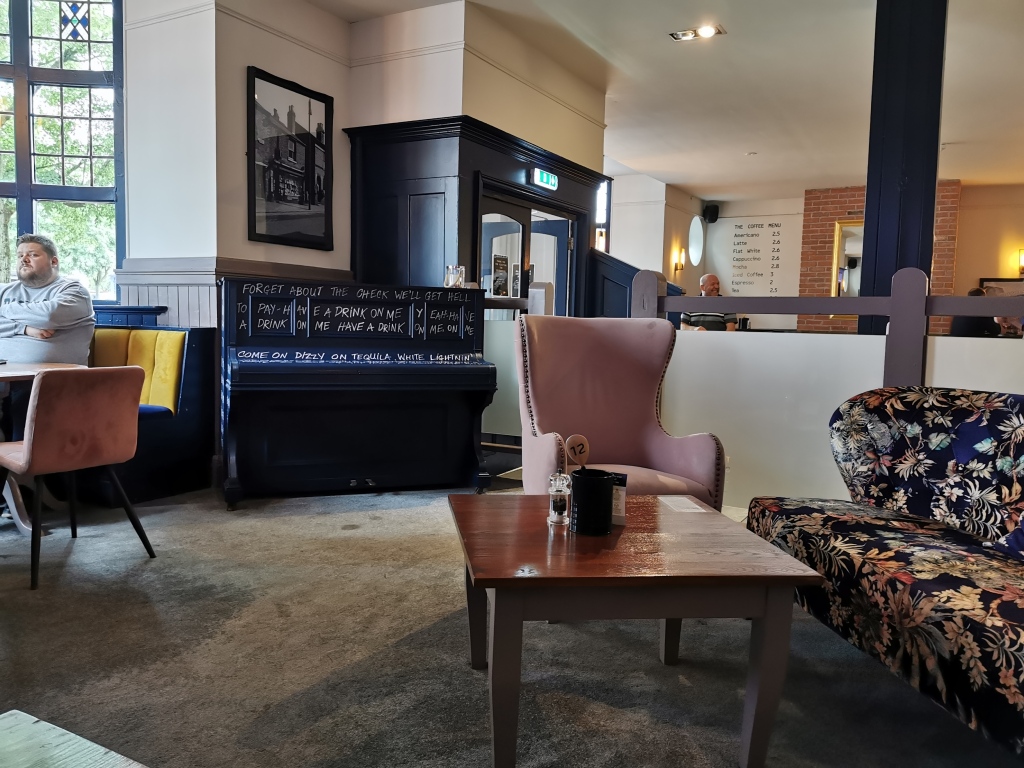 Cozy Bournbrook Inn restaurant with plush seating for informal meetings and networking events.