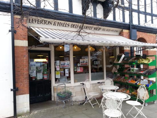 Quaint Leverton and Halls cafe with outdoor seating for casual meetings and networking.