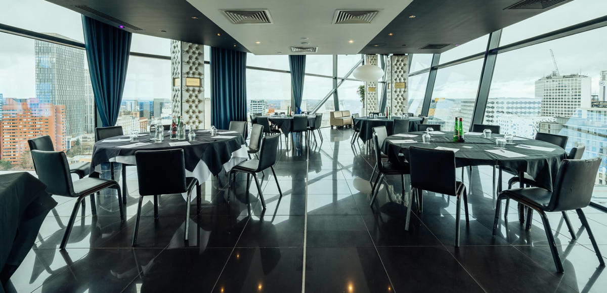 Modern event space at Hillscourt Hotel with panoramic views for corporate meetings.