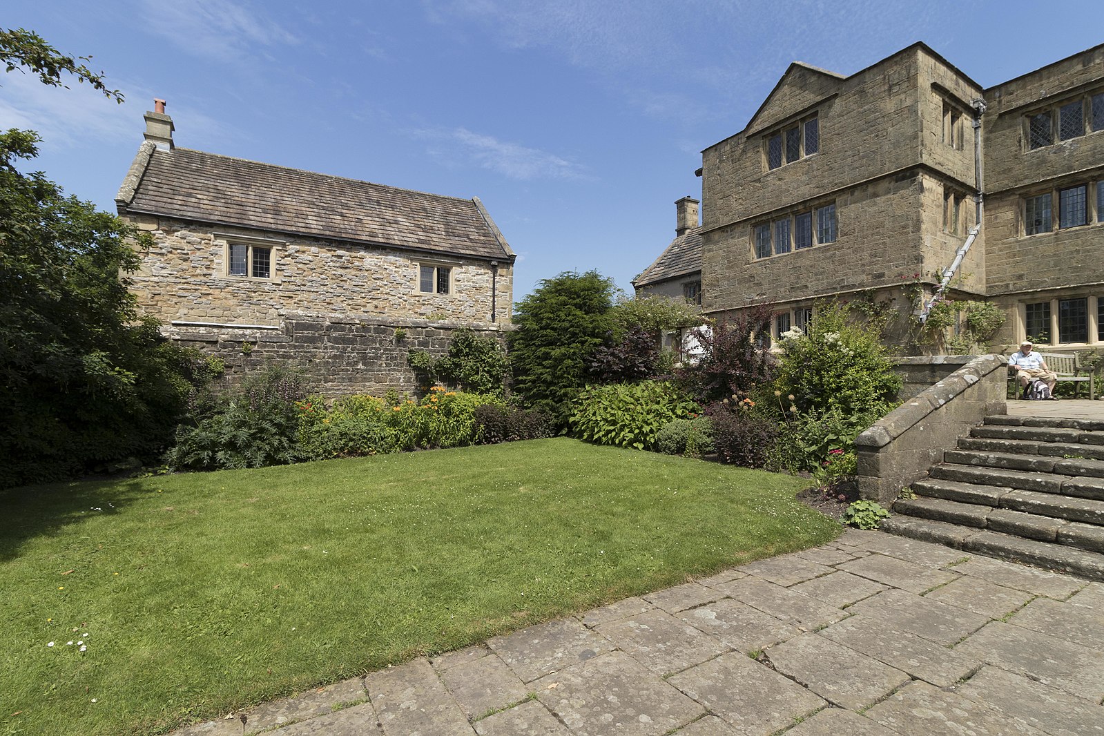 Historic Flagged Hall in Eyam: charming venue with gardens for weddings and outdoor events.