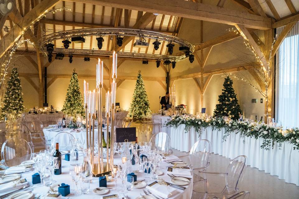 Elegant Redbrick Barn event space with festive decor for holiday gatherings.