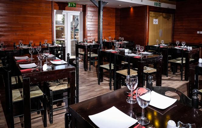 Meeting room at Kettering Ritz, featuring wooden decor for corporate events and gatherings.