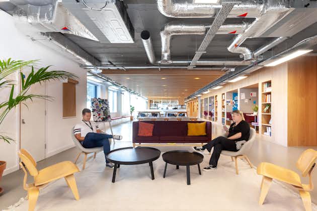 Modern lounge area in Virtual Office Solutions, perfect for networking and meetings.