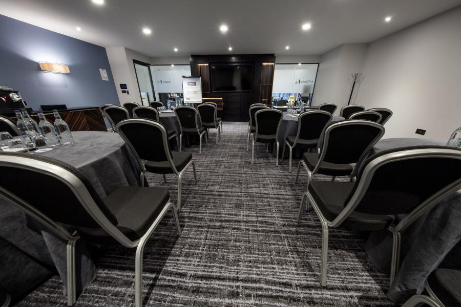 Speedwell Room: modern meeting space for corporate events with collaborative seating.