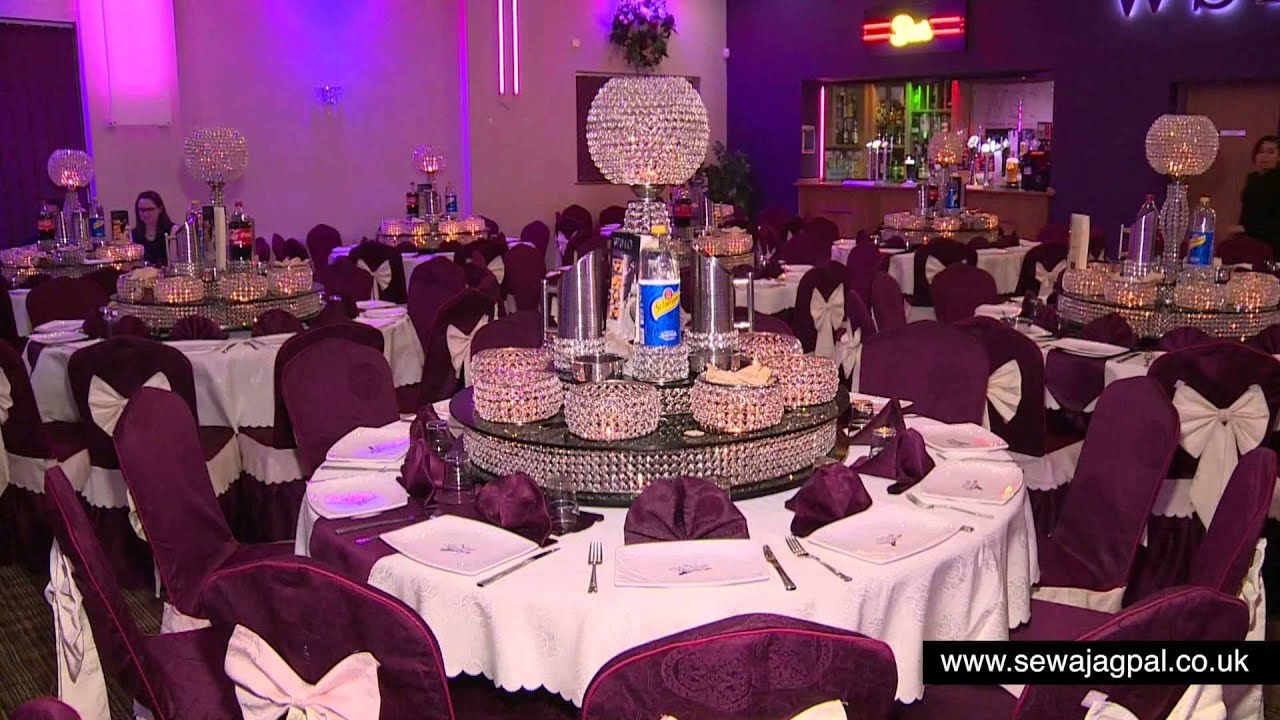 Elegant banquet hall with round tables, ideal for weddings and corporate events.