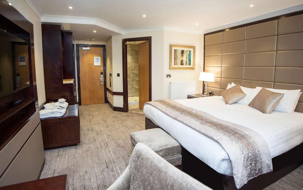 Modern hotel room at Park West, Ramada Solihull, ideal for event attendees and relaxation.