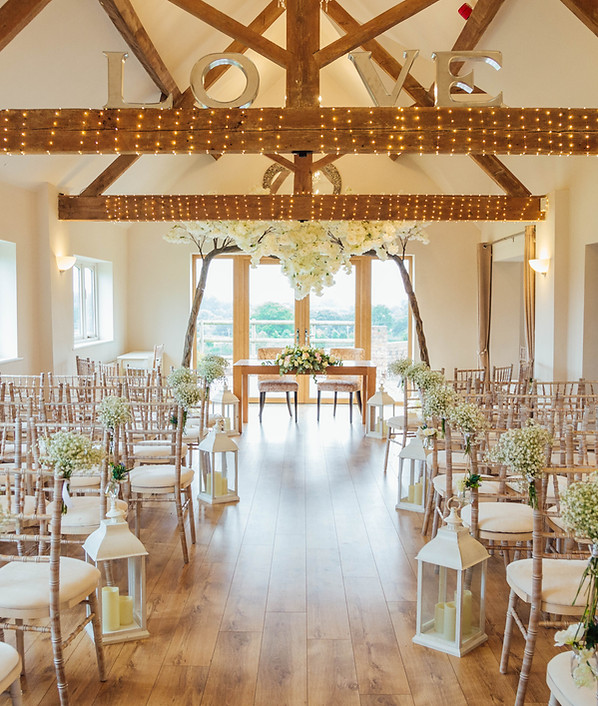 Luxury Glazed Garden Marquee with floral decor for romantic Bordesley Park weddings.