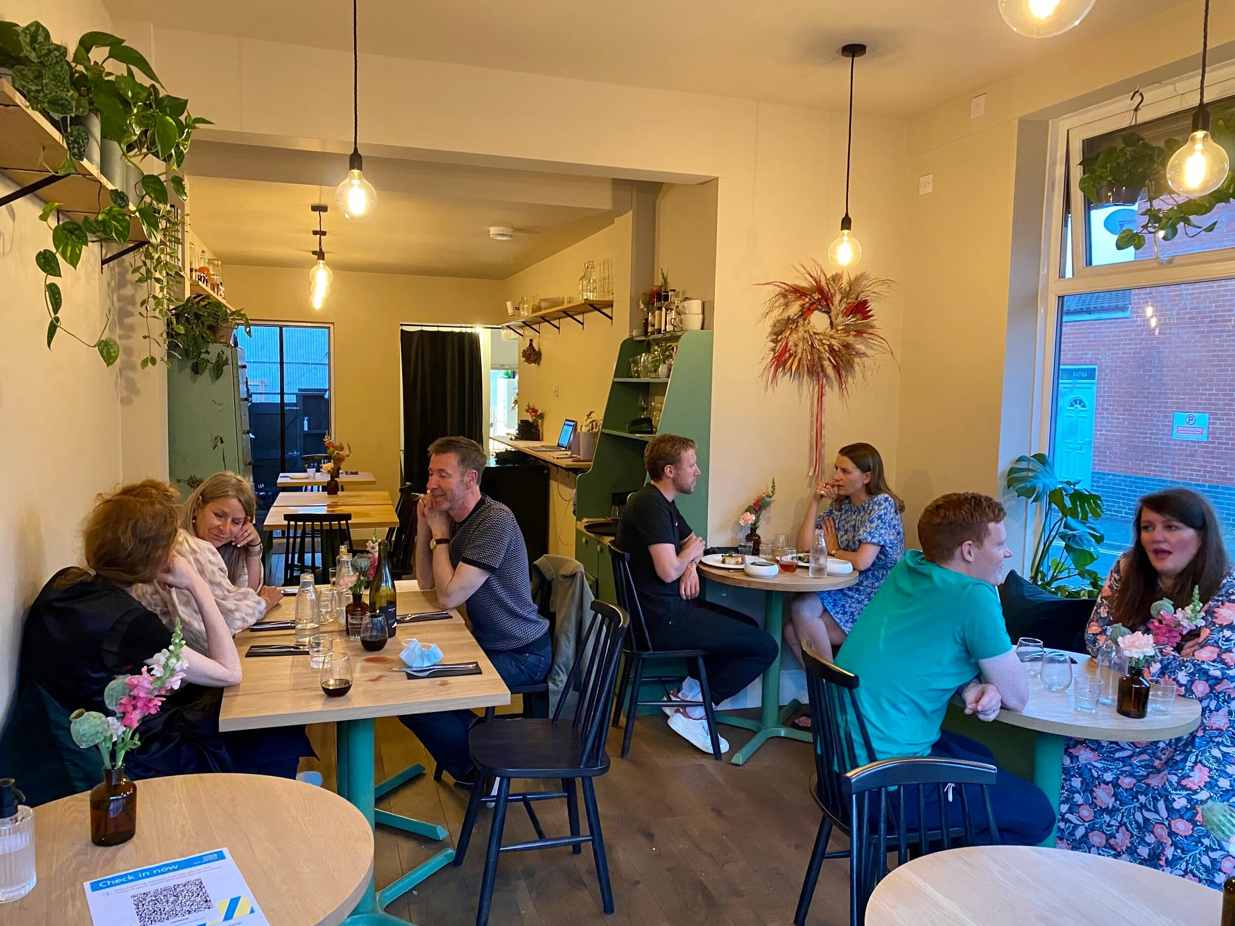 Cozy dining space in Verbena, perfect for networking events and small gatherings.