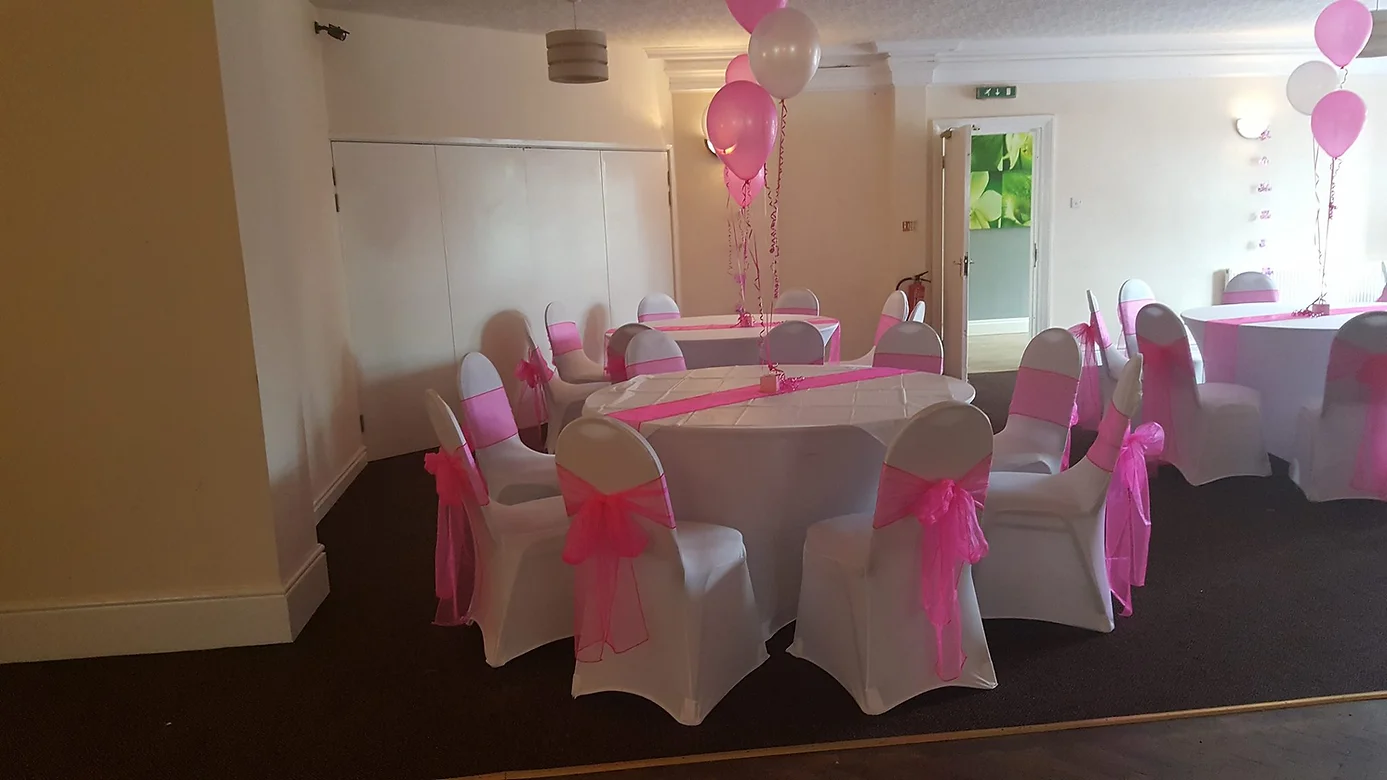 Function Room at HGC Club with round tables, perfect for weddings and birthday parties.