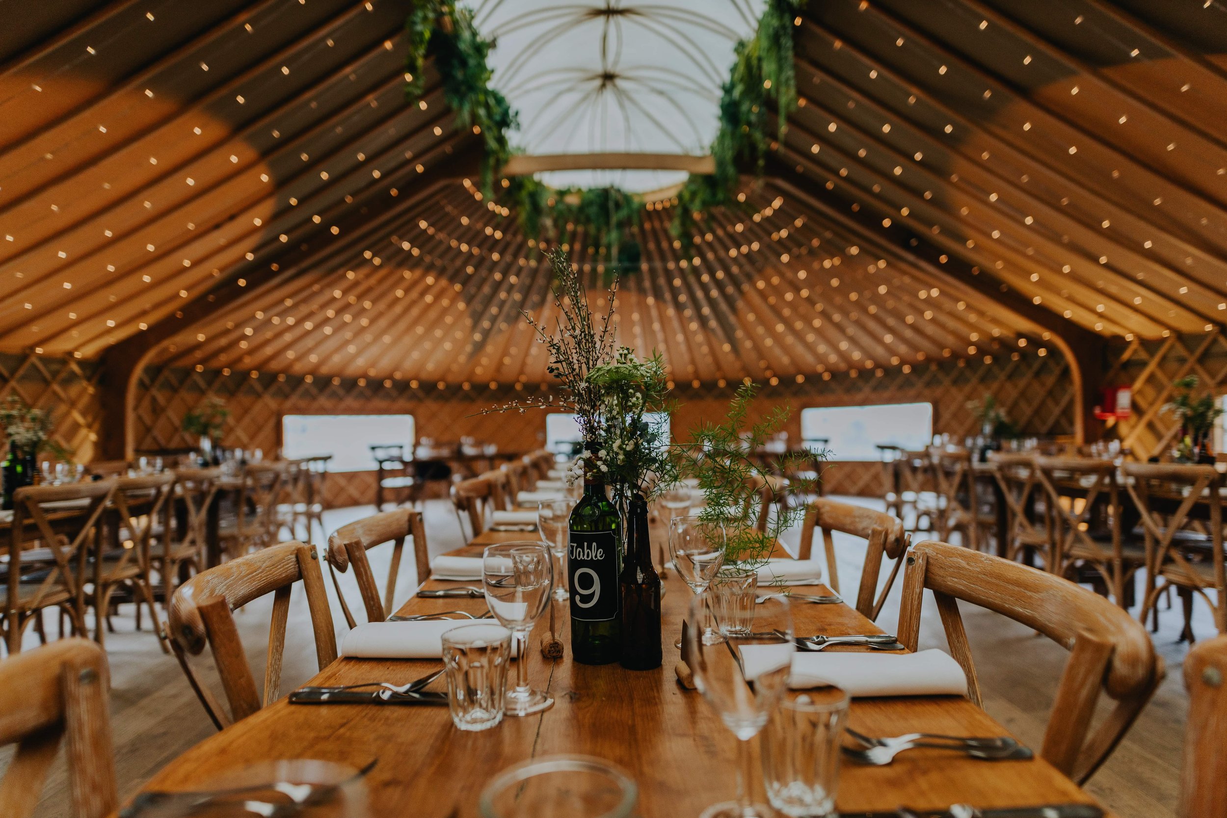 Ceremony Room in Thorpe Garden with rustic tables, ideal for weddings and corporate events.