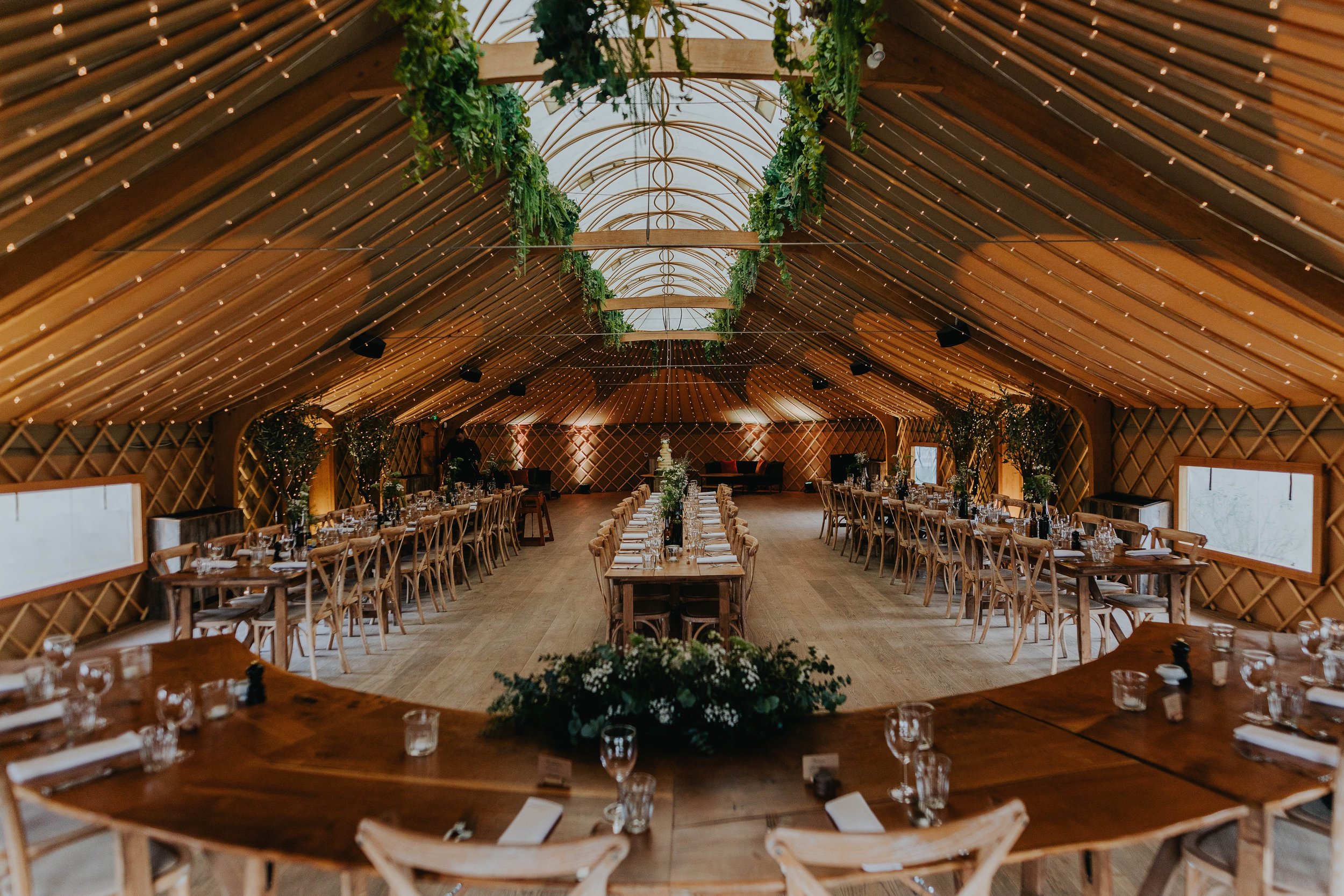 Ceremony Room in Thorpe Garden with rustic beams, ideal for events and gatherings.