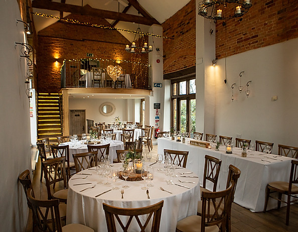Catesby Barn event space with rustic decor, ideal for weddings and gatherings.