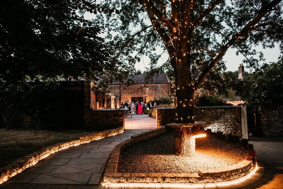 Courtyard Barn at Dodmoor House, illuminated venue for elegant weddings and receptions.