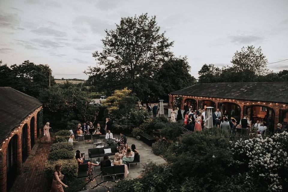 Mezzanine Bar at Dodmoor House, outdoor event space with string lights for weddings and gatherings.