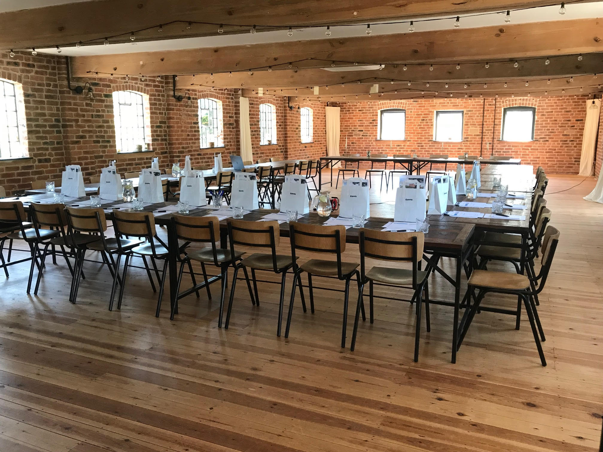 Meeting space in Haarlem Mill with rustic decor, ideal for events and workshops.